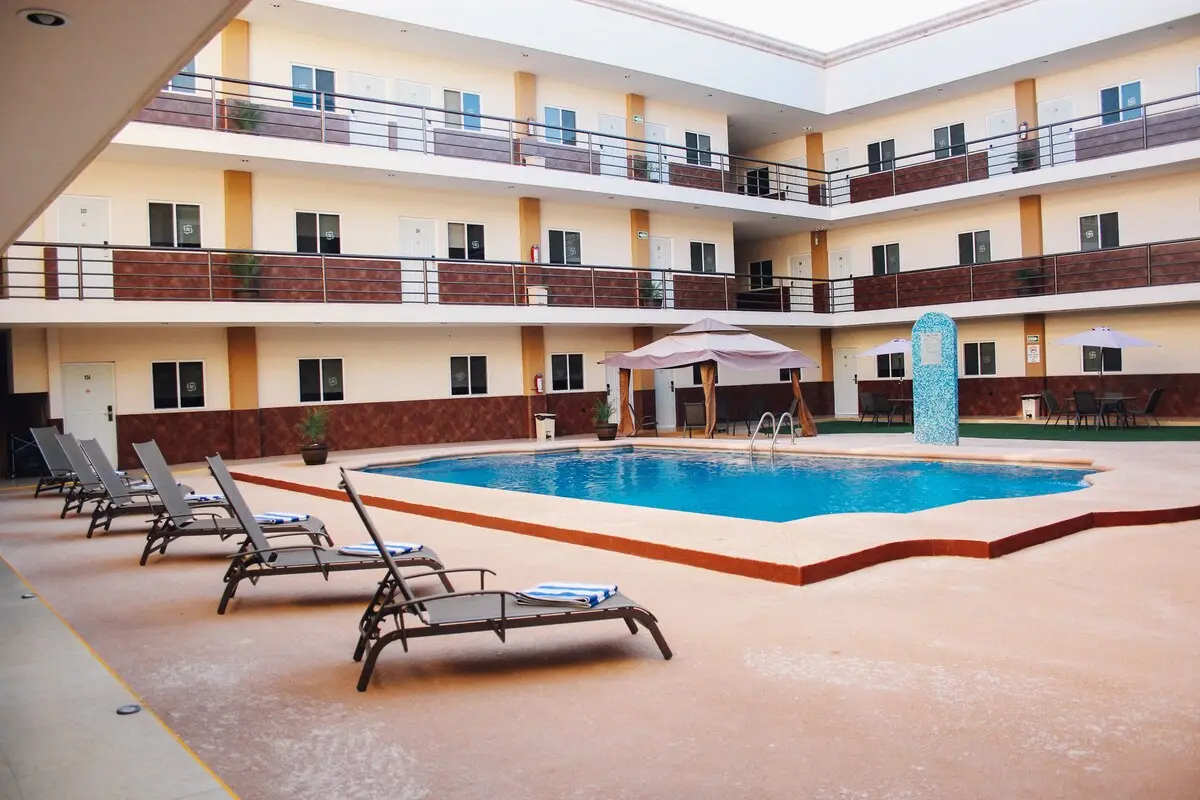 Sunny outdoor pool courtyard at the hotel